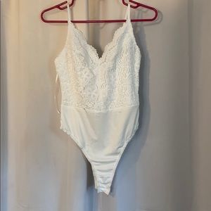 NWT premium White Lacey bodysuit
